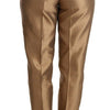 Dolce & Gabbana Elegant Tapered Silk Trousers in Gold